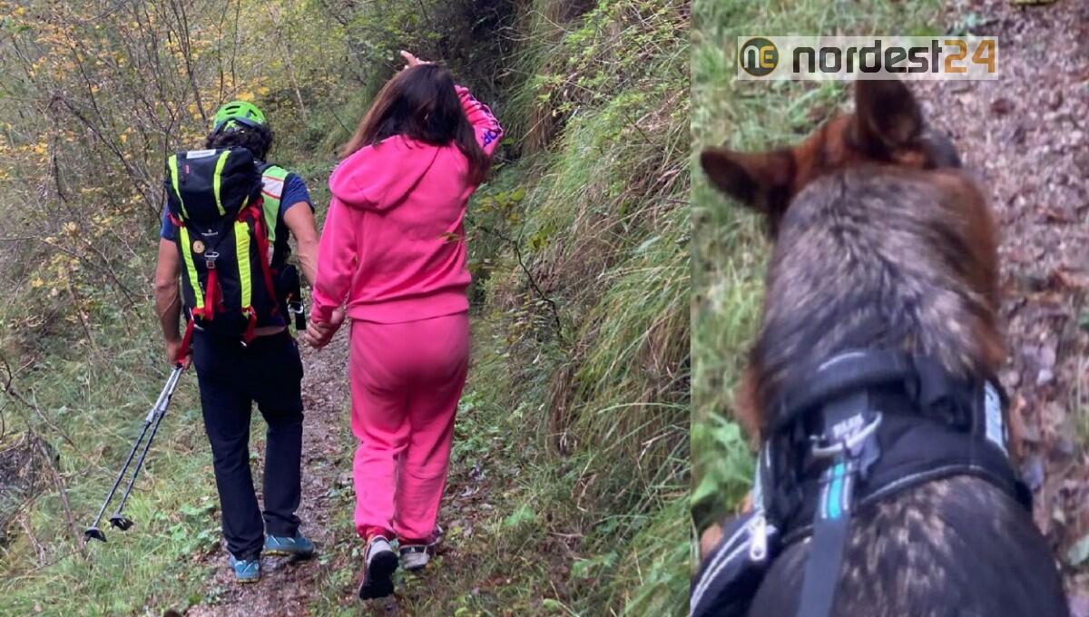 Soccorsa escursionista fuori dal sentiero con due cani - 