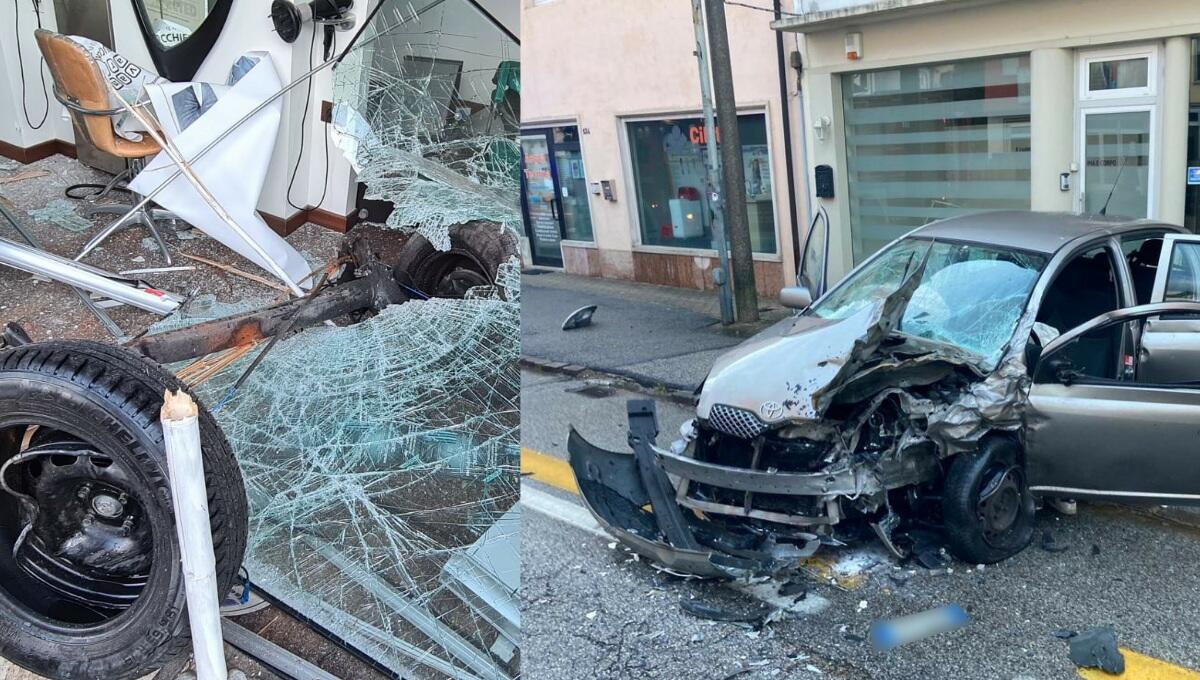 Schianto tra auto: una sfonda la vetrina, un conducente fugge a piedi - 