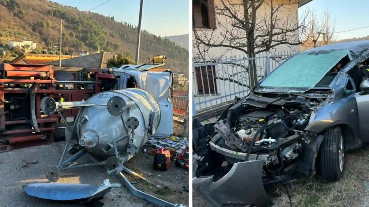 Camion con silos si ribalta e distrugge un'auto parcheggiata -