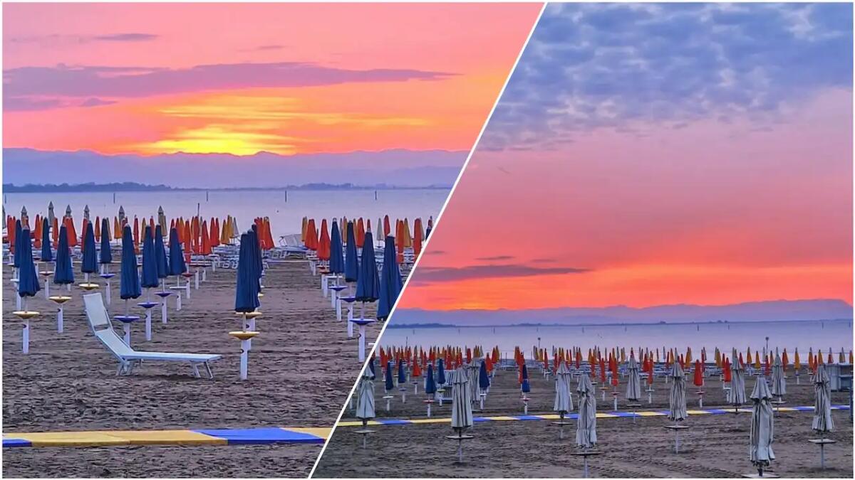Un'alba rossa ha colorato mare, cielo e spiaggia di una Località friulana - 
