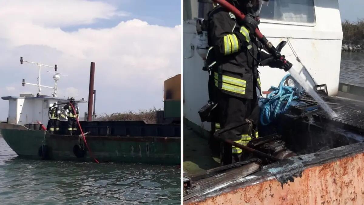 Fiamme in un'imbarcazione ad uso draga nel Canale Litoranea Veneta a Grado - 