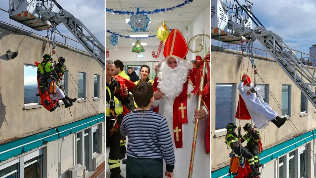 Arrivano in "volo" con l'autoscala dei pompieri i doni per i bambini dell'Ospedale Burlo di Trieste -