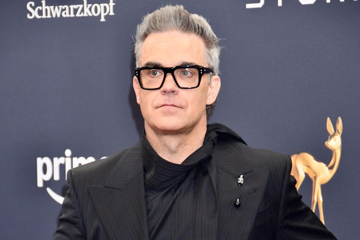 Robbie Williams: "Sanremo? Nel '94 con i Take That ero sotto l'effetto" - 