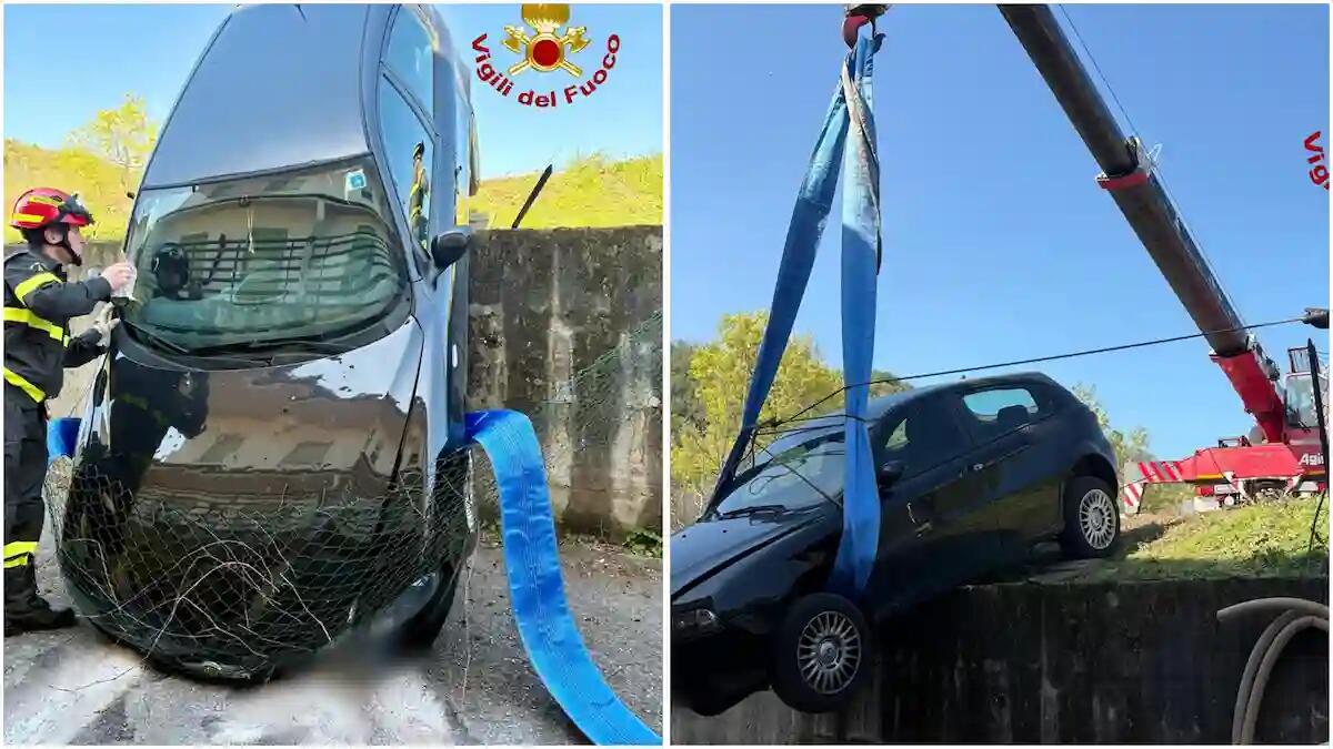 Auto parcheggiata precipita dal muretto, recuperata con l'autogru: non ci sono persone coinvolte - 